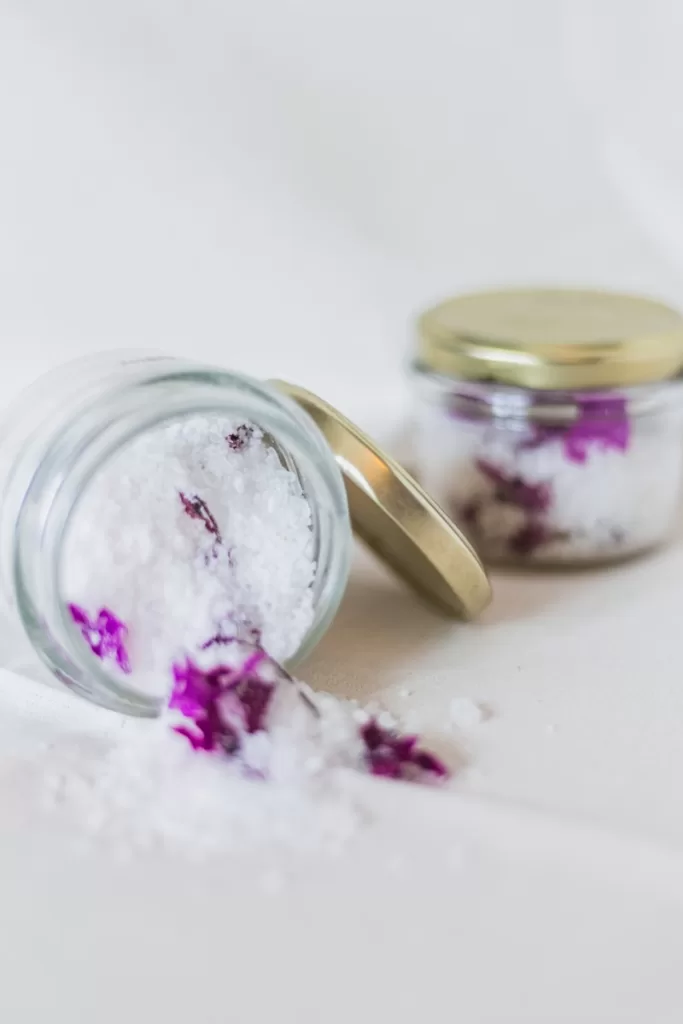 white salt on glass jar