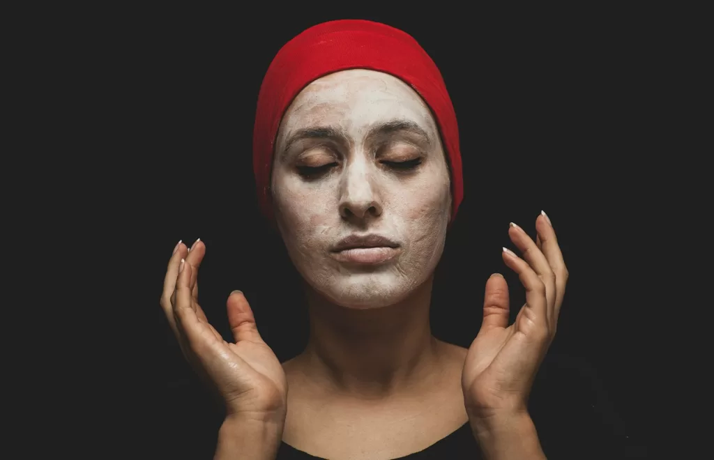 Best Powered Facial Cleansing Brushes & Devices in India: Your Guide to Radiant Skin woman with red hijab on her head