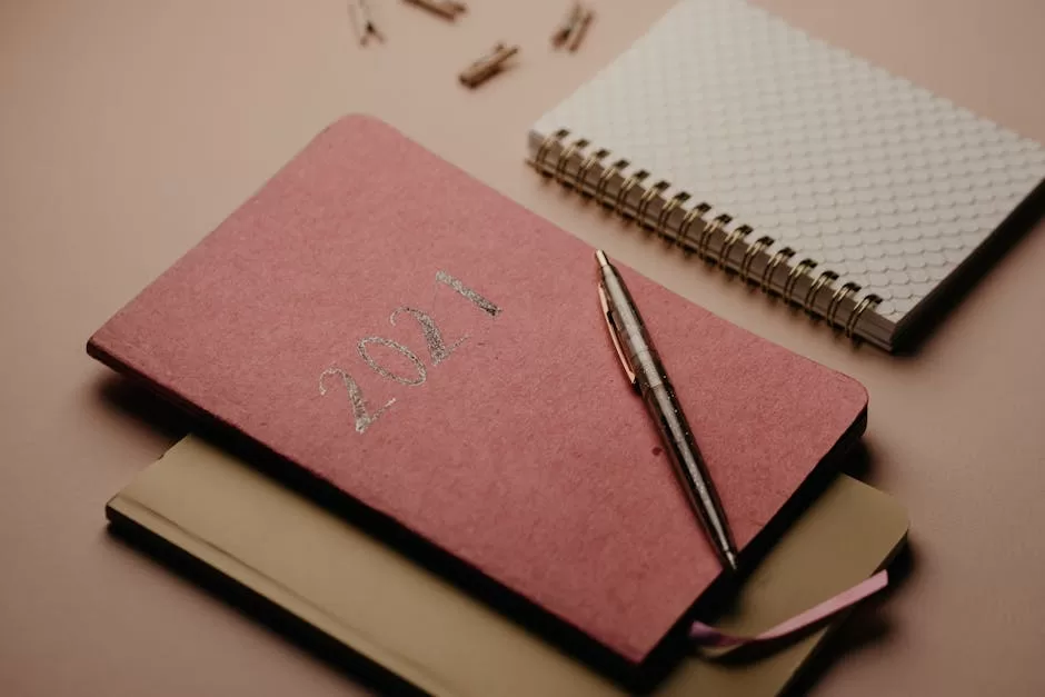 Best Address Books in India: 5 Office Picks for Reliable Contact Storage Minimalist planner, notebooks and pen on a brown background, reflecting buying guide choices for address books in India