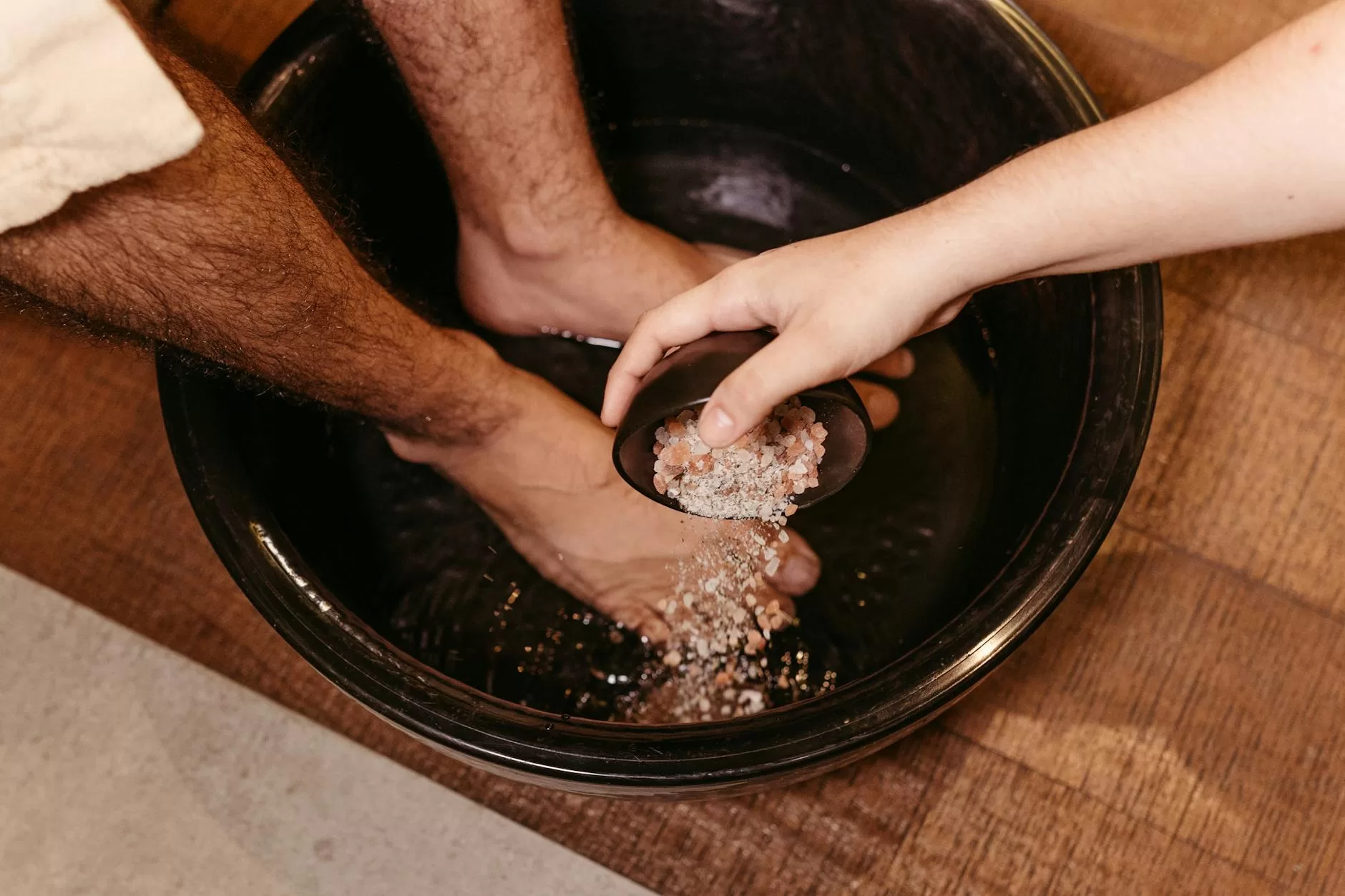 Best spa slippers in India - relaxing home foot soak with bath salts, the self-care moment a quality spa slipper supports